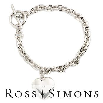 Child's Sterling Silver Locket Charm Bracelet. 7.5"
