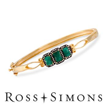 2.85ct t.w. Emerald, .25ct t.w. Diamond Bangle Bracelet In Two-Tone. 8"