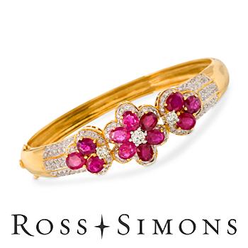 C. 1980 Vintage 7.00ct t.w. Ruby, 2.30ct t.w. Diamond Floral Bangle Bracelet. 6.5
