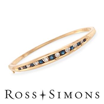 C. 1990 Vintage 1.50ct t.w. Sapphire, 1.00ct t.w. Diamond Bangle Bracelet. 6.5