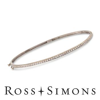 C. 1960 Vintage .55ct t.w. Diamond Bangle Bracelet In Gold. 7.25